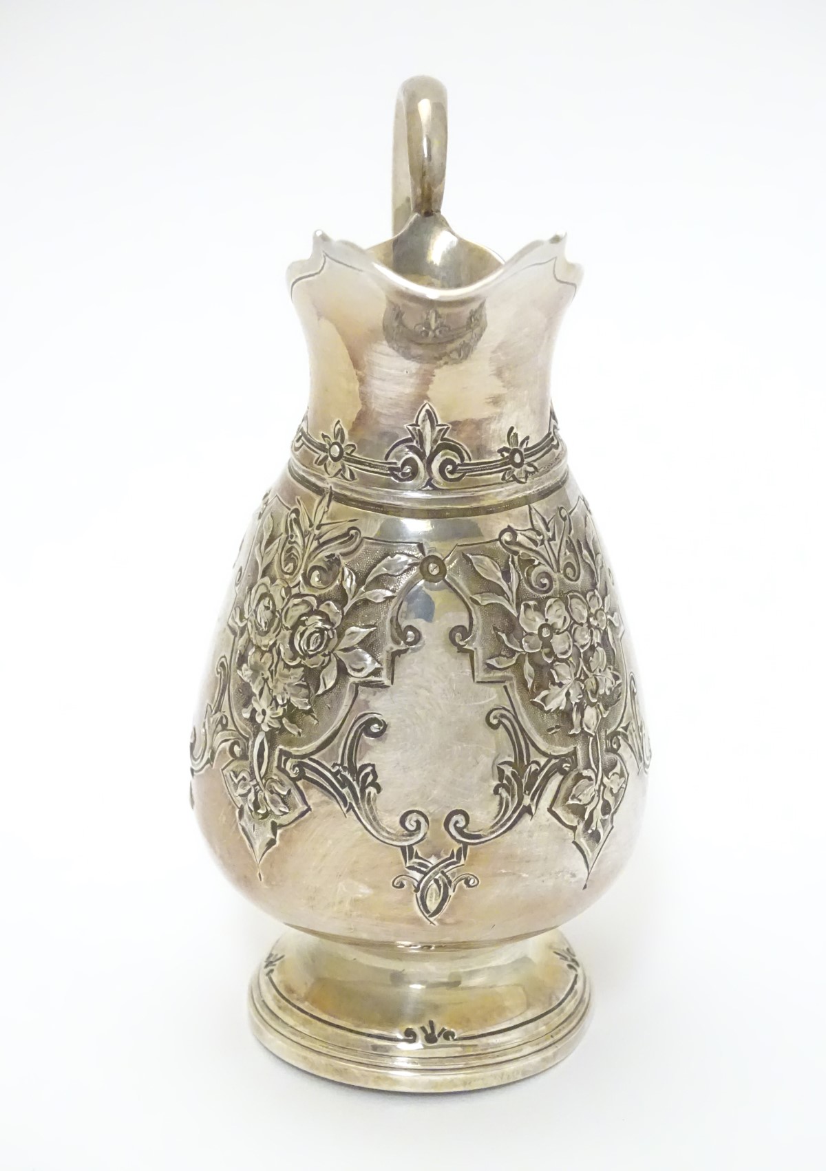 A Victorian silver cream jug hallmarked Sheffield 1870 maker Martin, Hall & Co. - Image 5 of 6