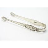 Geo III silver sugar tongs with bright cut decoration hallmarked London 1800 maker George Smith &