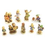 A collection of 9 Hummel Goebel countryside figures, comprising: Best Friends (model no.