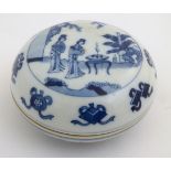 A Chinese blue and white circular ink pot and cover,