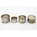 Four various silver napkin rings, including a .
