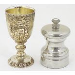 A 20thC pepper mill / grinder, together with a silver plate footed cup. Approx.