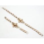 A silver gilt metal choker necklace and bracelet set with pearls.
