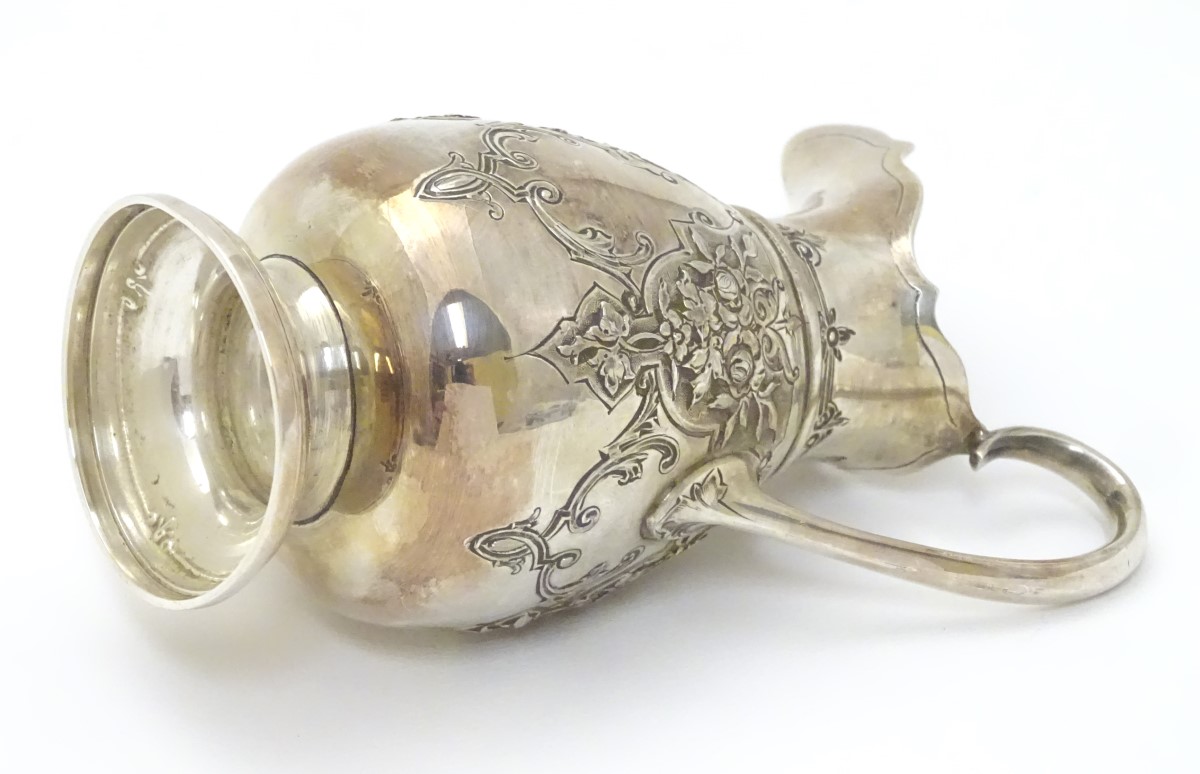 A Victorian silver cream jug hallmarked Sheffield 1870 maker Martin, Hall & Co. - Image 6 of 6