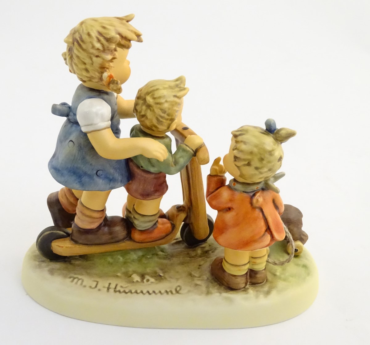 A large Hummel Goebel figural group, Scooter Time! (model no. 2070), on a titled wooden base. - Image 5 of 5