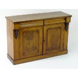 A mid / late 19thC mahogany chiffonier with a rectangular top above two short cushion drawers and