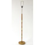 Vintage Retro: A Danish (Scandi) telescopic standard lamp with a teak and brass column on an