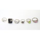 6 assorted silver / white metal rings CONDITION: Please Note - we do not make