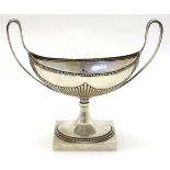 A German .800 silver pedestal dish of twin handle urn form. Marked TH Strube & Sohn.