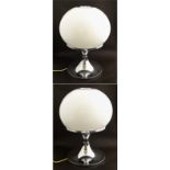 Harvey Guzzini : A pair of mid century modern retro table lamps with chromed tulip stem and