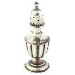 A silver pepperette hallmarked Birmingham 1900 maker Cornelius Desormeaux Saunders & James Francis