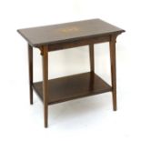 An early 20thC rosewood occasional table with a rectangular top having marquetry decoration and