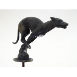 A car mascot formed as a cast model of a greyhound. Approx.
