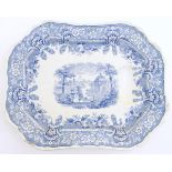 A large blue and white, tree and well stoneware platter / serving dish,