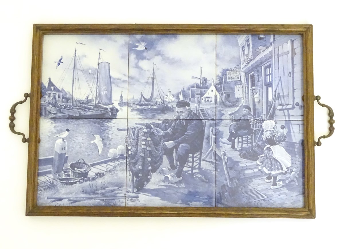 A wooden tray with 6 delft blue tiles decorated with a harbour scene with boats, a windmill,