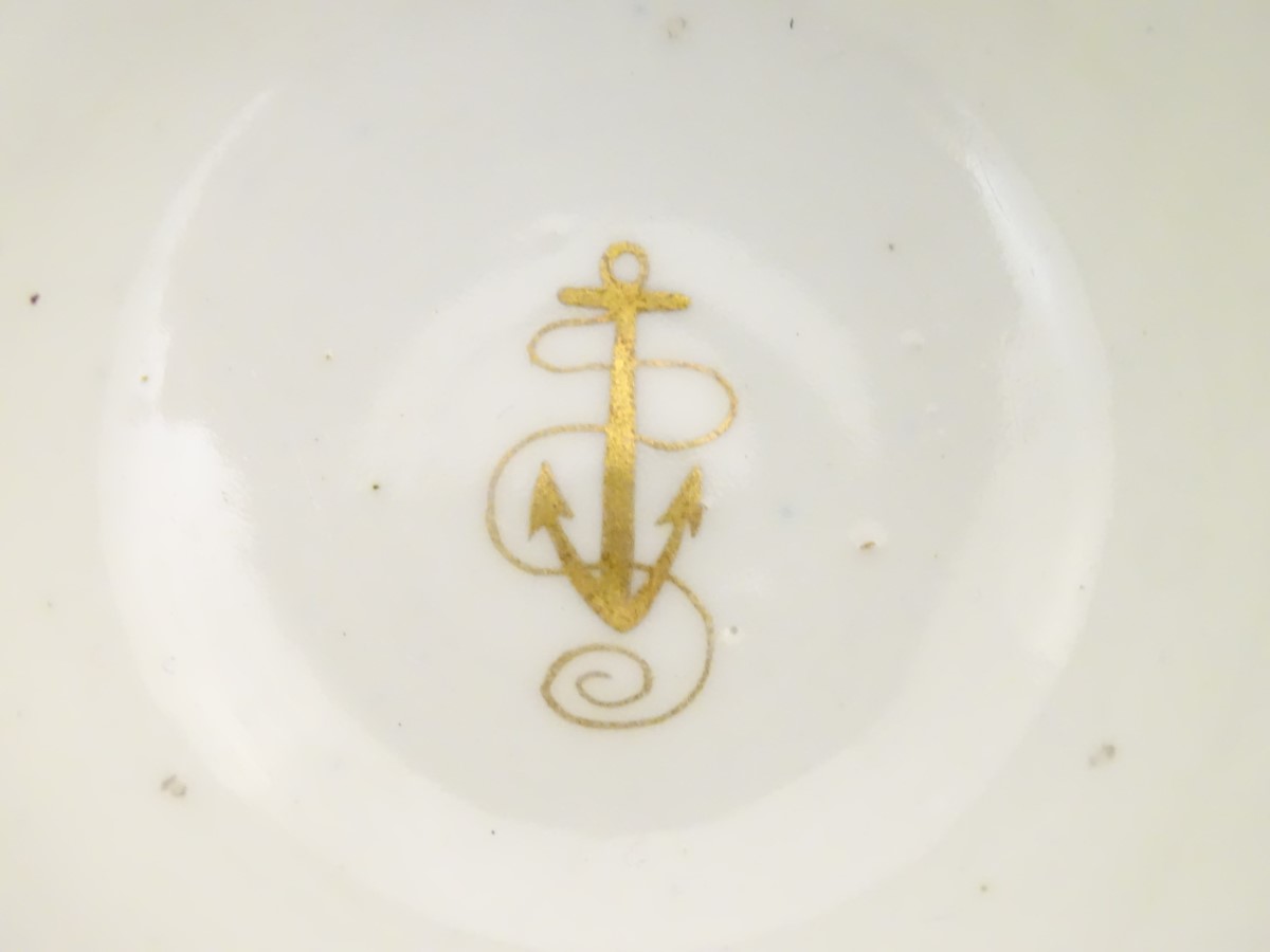 A 19thC white porcelain tea bowl with ribbed sides and gilt decoration of stylised foliage and - Image 5 of 7