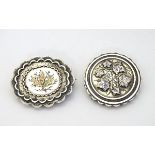 Two Victorian silver brooches one with thistle decoration.