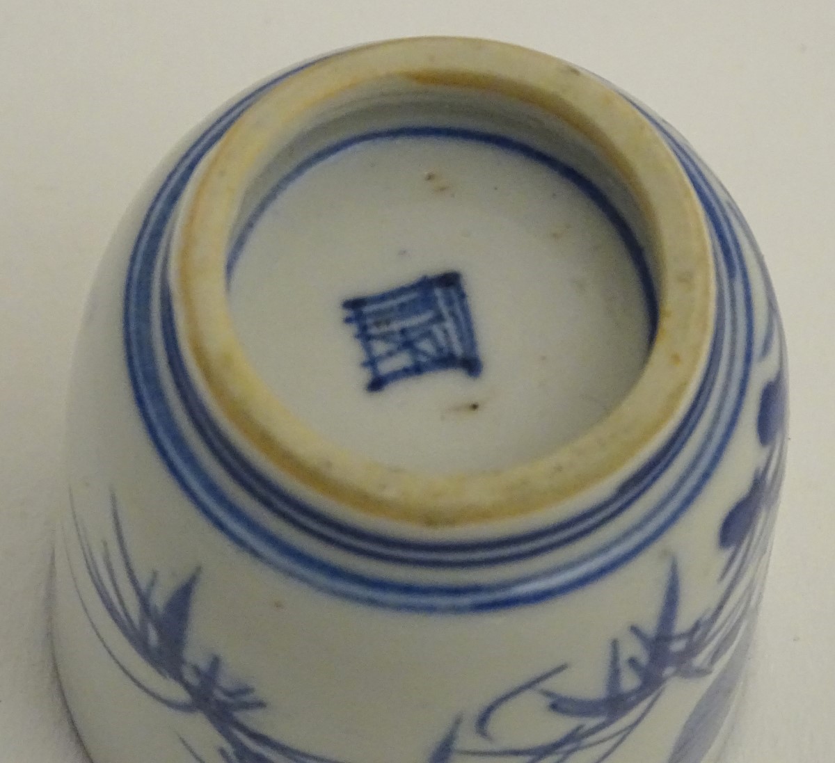 A Japanese blue and white pot with hand painted floral and foliate decoration. - Image 6 of 8