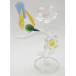 A Swarovski-style crystal table centrepiece, formed as a branch with flowers and perching bird.