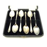A cased set of 6 silver teaspoons hallmarked Birmingham 1930 maker Raeno Silver Plate Co Ltd.