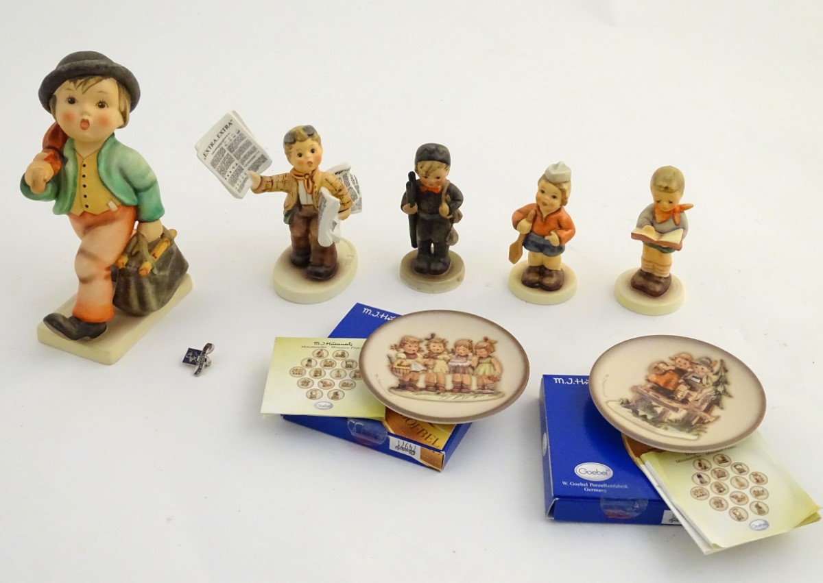 A collection of 6 Hummel Goebel figures, comprising: a large figure Merry Wanderer (model no.