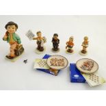 A collection of 6 Hummel Goebel figures, comprising: a large figure Merry Wanderer (model no.