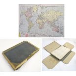 A cloth board folio containing a large quantity of 20thC coloured maps from The Daily Telegraph