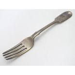 A Victorian fiddle pattern dessert fork, hallmarked Exeter 1864,