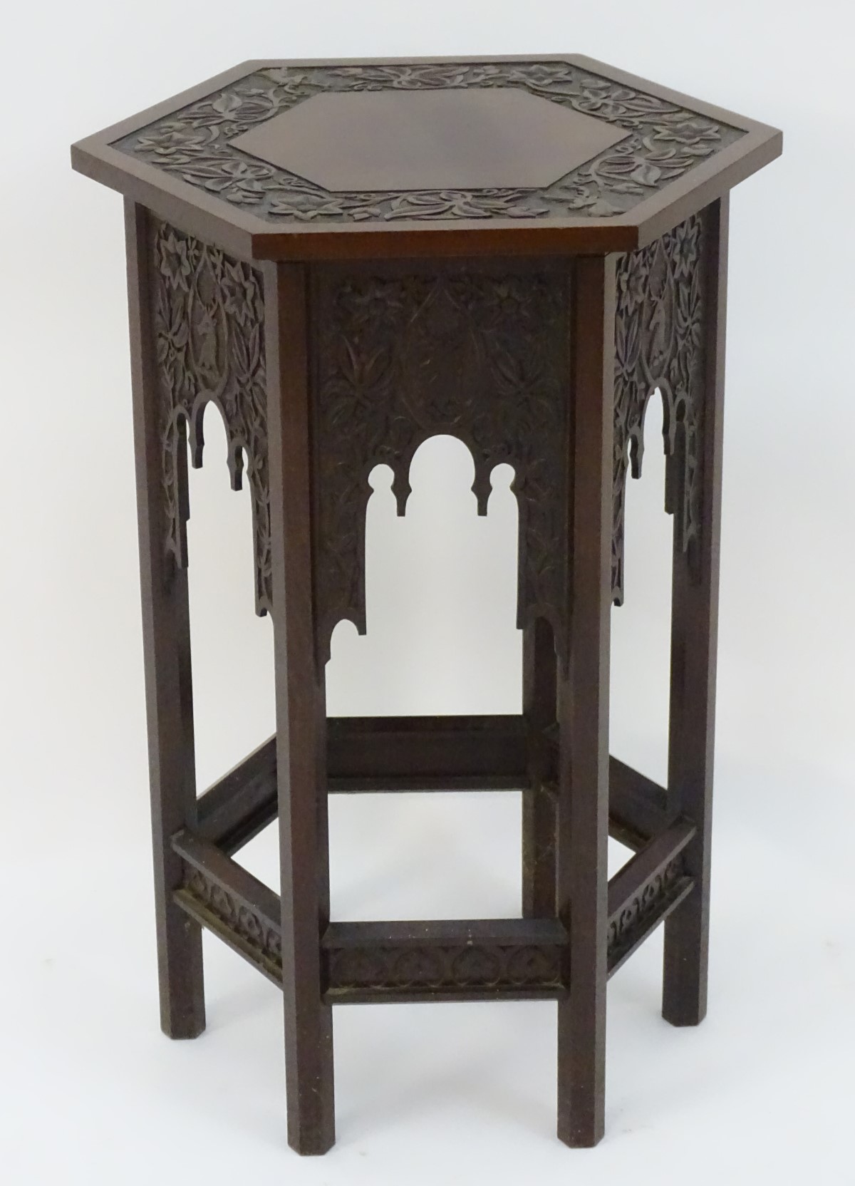 A walnut Liberty style table with a hexagonal carved top above six matching carved facades with - Image 3 of 13