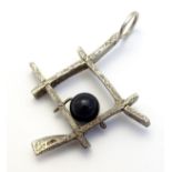 A Scandinavian Modernist silver pendant marked 'Sterling Bdrd.