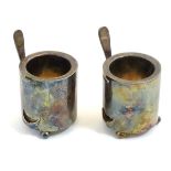 A pair of silver plate egg coddlers / heated egg cups with screw stopper to base for provision of