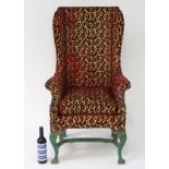 A late 19th / early 20thC Continental slim wingback armchair,