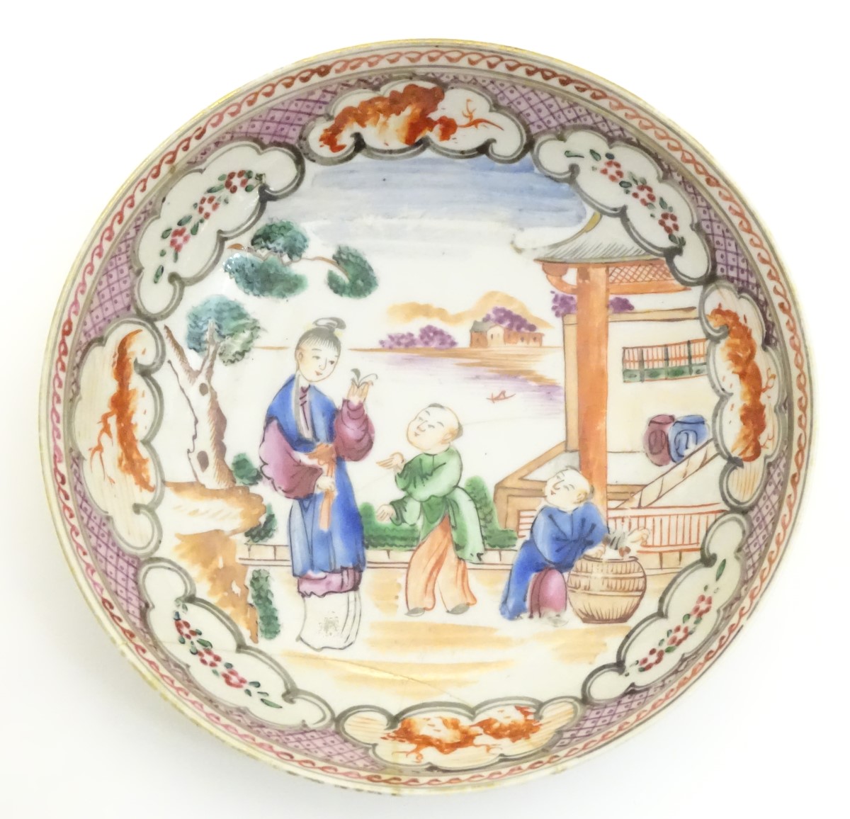A Chinese famille rose tea bowl and saucer with hand painted decoration depicting figures on a - Image 4 of 7