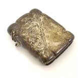 A silver vesta case with engraved decoration hallmarked Birmingham 1902 maker S Blanckensee & Sons