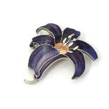 A Vintage brooch of floral form with enamel decoration.