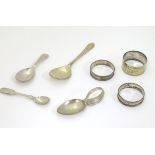 A pair of silver napkin rings hallmarked Birmingham 1929 maker E Edmonds together with assorted