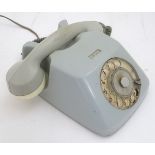A 20thC West German desk telephone, marked 'TN' (Telefonbau Normalzeit), in sky blue finish,