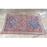 Rug / Carpet : an antique Caucasian rug , a flat weave woollen rug with some loose ends verso ,