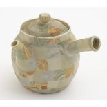 A Japanese banko nerikomi / neriage / agateware teapot with spout and pouring handle,
