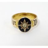 Mourning / memorial jewellery: A 19thC gold ring with black enamel and diamond decoration.