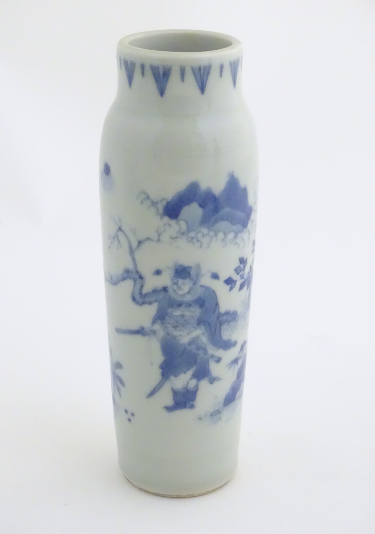 A Chinese blue and white vase of narrow form, depicting figures in a stylised landscape. Approx.