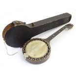 Musical Instruments: an early 20thC 'Supremus' banjo by Geo P. Matthew, Birmingham England.
