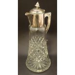 A late 19th / early 20thC cut glass claret jug with silver plated mounts,