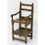 A rare early 18thC mixed wood childs chair,