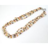 A coloured pearl 4 strand necklace 18" long CONDITION: Please Note - we do not