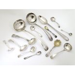 Assorted silver plated items including various ladles, stuffing spoon,