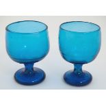 Two 19thC turquoise soda glass pedestal drinking glasses. Approx. 5" high.