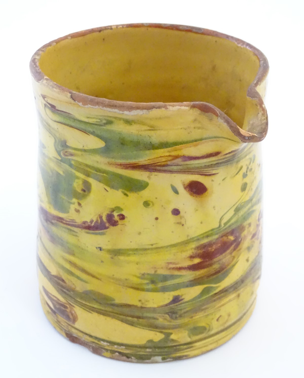 A 19thC studio pottery slipware jug with a yellow ground. Indistinct incised mark under. Approx. - Image 3 of 7