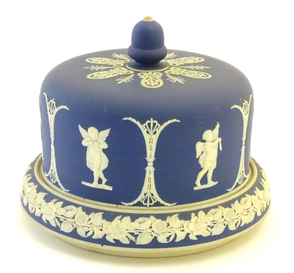 A blue and white cheese dome and stand in the manner of Wedgwood Jasperware,