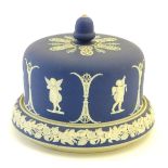 A blue and white cheese dome and stand in the manner of Wedgwood Jasperware,